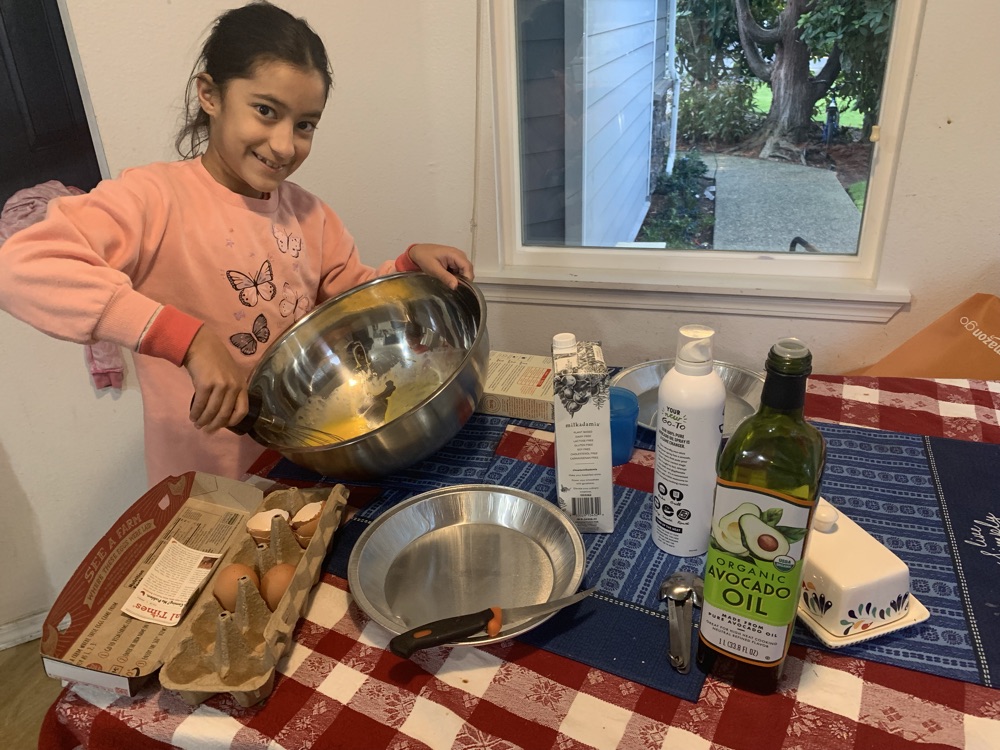Hanna mixing batter with organic ingredients